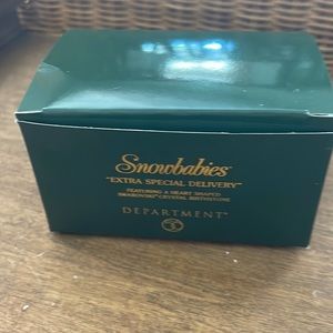 Snowbabies- “ extra special delivery” - august birthstone